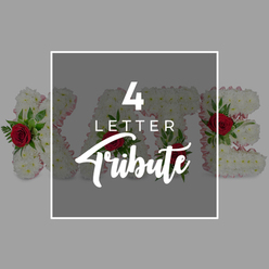 This image presents a serene, carefully styled view of a custom four-letter funeral flower tribute, the sort of personalised piece often ordered for quiet services in Canonbury's local churches and chapels. The design is captured from above, so the viewer sees the strong shapes of four floral letters arranged in a row, reminiscent of the name "KATE," though the emphasis is on the concept rather than a specific word. Each letter is densely packed with white chrysanthemums, their small, layered petals giving a plush, cloud-like surface that feels soft even just to imagine touching. A trim of pale pink ribbon or fabric peeks out along the edges, introducing a subtle blush that suggests tenderness without overpowering the whites. Nestled into this cushion of chrysanthemums are rich red roses, spaced thoughtfully at focal points within each letter and surrounded by glossy green leaves and feathery foliage. These roses form emotional anchors in the design, conveying love, loss, and gratitude with their deep colour. Over the centre of the arrangement lies a dark grey, semi-opaque square, bordered by a delicate white frame. The text "4 LETTER" appears at the top in crisp white capitals, while the word "Tribute" flows beneath in a graceful script, the large numeral 4 adding structure and clarity. You can still glimpse the forms and colours of the letters behind the overlay, as if seeing them through a soft veil. The surrounding background is a light, uninterrupted grey, further highlighting the tribute. Altogether, the composition communicates the idea of a bespoke, four-letter sympathy arrangement, lovingly crafted for memorials and farewell services across Canonbury and the nearby Islington streets.