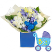 A bright, celebratory bouquet arranged as a tender welcome for a newborn baby boy: a rounded cluster of fresh white roses, creamy lilies with just-visible yellow stamens, and pillowy white chrysanthemums that give the composition a soft, comforting weight. Scattered through the white base are electric blue chrysanthemums that read like joyful punctuation, alongside clusters of soft lavender-periwinkle, bell-shaped blooms-suggestive of hyacinth or campanula-that add a delicate, powdery texture. Broad glossy leaves and feathery fern fronds lift the arrangement, their verdant tones creating a cooling contrast to the cool blues and white petals. The flowers are gathered and wrapped in crinkled, translucent cream paper that offers a quiet, tactile sheen, and the whole sits neatly in a deep royal blue rectangular gift box whose matte finish anchors the palette. To the right, a light-blue foil balloon shaped like a vintage baby pram floats just above the box; its canopy and wheels are highlighted in darker blue dots and hearts, and playful yellow-and-lime lettering across the body proclaims It's a Boy. In soft morning light the petals take on a gentle glow and the scent is faintly green and floral-a comforting mix of rose and lily perfume with a cool, hyacinth-like lift. I picture this set arriving at a hospital bedside or a new home in Canonbury, wrapped for handover to delighted parents, a simple and elegant way to say congratulations. The composition balances classic white blooms and contemporary electric blue accents, designed to convey warmth, freshness, and celebration without saying a word.