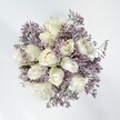 Serene and delicately composed, this bouquet captures the subtle elegance of Canonbury-where creamy white roses, each one full and softly open, are lovingly embraced by a veil of lavender statice. The roses, warm ivory in tone, boast smooth, velvety petals that curl inward to shelter their golden hearts, while the statice flutters around them in airy sprays, their pastel blossoms almost featherlike. In the gentle daylight filtering from Richmond Crescent, the combination feels pure, graceful, and overflowing with quiet promise. The contrast between the roses' lushness and the statice's papery texture is visually enchanting-suggesting early spring mornings and the hush of a peaceful garden retreat. Light, slightly powdery florals intermingle with subtle herbal notes, filling the air with comforting freshness. Whether for a wedding at a local venue, a heartfelt anniversary, or a tranquil moment at home, this arrangement, expertly crafted by your Canonbury florist, carries a promise of sincerity, affection, and enduring comfort-a reflection of the thoughtful care at the heart of Canonbury's flowercraft.