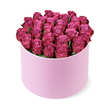 From a slightly elevated vantage, Canonbury Flowers presents a luxurious dome of dozens of tightly packed fresh roses in a deep fuchsia hue. The blooms are arranged with careful, almost architectural precision inside a round hat box in soft pastel pink, its velvet-matte finish echoing the petals' own softness. Each blossom carries a hint of variation-centres light as blush, outer petals deepening to berry tones-so the colour reads as a living jewel that shifts with the light. The dome is lush and complete, the heads meeting in a generous crown that rises just to the box's rim, suggesting abundance, romance, and celebration. There is minimal green foliage, chosen to let the roses sing and to emphasize their sculptural form. The scene is captured from a slightly elevated angle against a clean, bright white background, which makes the colour pulse and the artistry clear to the viewer. This composition feels like a refined luxury gift-perfect for milestones, anniversaries, or a dramatic 'just because' gesture. In Canonbury and the surrounding Islington streets, this style is cherished for its timeless elegance; Canonbury Flowers can deliver it with same-day service across Canonbury, Upper Street, Barnsbury, and surrounding postcodes, bringing a touch of high-end romance to homes and events. Touch, scent, and glow are suggested: a bouquet that promises freshness, a soft velvet touch to the fingertips, and a celebration-ready atmosphere that elevates any room it touches.