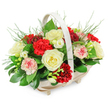 A tastefully composed funeral flower basket sits against a bright white background, its colours carefully chosen to convey both love and serenity for a Canonbury farewell. The container is a shallow, oval basket made from pale, natural wood, resting on small, unobtrusive feet that lend a slightly elevated, refined look. A smooth, light-coloured handle rises in a soft arch over the arrangement, echoing the gentle lines of the flowers within. The bouquet forms a compact, rounded dome that spills just over the basket's rim, giving a feeling of abundance without excess. At the heart of the design are creamy white roses, fully opened so that their layered, velvety petals create soft spirals of light in the centre of the piece, symbolising purity and a peaceful goodbye. Clustered among them are rich red carnations, each bloom densely ruffled, adding depth, texture, and the deeper emotional tone of enduring affection. Some carnations are bi-coloured, with pale petals tinged or edged in pink and red, introducing subtle variation that softens the transition between the white roses and dark red flowers. Smaller white blossoms, reminiscent of freesias, appear here and there on slender stems, their open, bell-like forms lending a sense of delicacy and quiet breath. The greenery is generous yet controlled: broad, glossy leaves cradle the flowers from below, while slender, feathery fronds and fern-like sprigs rise at the edges and from within, giving the arrangement a natural softness similar to the greenery found along the paths near Canonbury station. The overall mood is calm, respectful, and gently consoling, perfect for placing beside a framed photograph at a service or sending as a sympathy tribute to a grieving family in the local area.