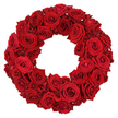 On a pristine white backdrop, a lush circular wreath comes to life from dozens of deep crimson roses, each bloom pressed close to its neighbor to form a continuous ring of velvet texture. The largest heads dominate the outer circle, their velvety petals unfurling in spirals that catch the light and deepen the ruby tones, while smaller, partially opened roses and tightly furled buds fill every curve and crease with quiet assurance. The surface reads as a rich tapestry of red-the petals curling and folding in a way that invites the eye to travel across the wreath and linger on the subtle shadows between blooms. This classic arrangement-evocative of love, remembrance, celebration, and reverence-speaks softly of memorable moments shared in Canonbury and beyond. The crisp white background ensures the crimson glow remains the focal point, a refined stage for occasions from romantic declarations to heartfelt memorials. Created by a Canonbury-based florist, the piece embodies meticulous handcraft: secure wiring, careful spacing, and an even, circular silhouette that holds its shape with elegant discipline. In real life, the scent of roses mingles with a whisper of stems, a reminder of the freshness and care that goes into every bloom. Available for same-day delivery across Canonbury, Islington, and neighbouring streets such as Upper Street, Dalston, and Highbury, making it easy to mark an anniversary, greet a loved one, or pay tribute with timeless grace.