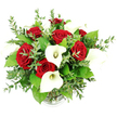 A lush, romantic bouquet of deep red roses and crisp white calla lilies fills the frame, set sharply against a bright white background that makes its colours glow. The arrangement, crafted in a rounded, abundant style, appears as though it could be gracing a dining table in a Canonbury townhouse or a small wedding reception near Islington. At the core, velvety red roses cluster together, their rich, saturated petals curling tightly into classic, full blossoms that immediately suggest passion, devotion and long-lasting love. Woven delicately among them, sculptural white calla lilies rise with graceful poise. Their smooth, trumpet-like spathes curl elegantly around slender, creamy yellow spadices, adding an architectural, modern touch that contrasts beautifully with the softness of the roses. Surrounding and threading through the blooms, layers of green foliage bring depth and natural movement. Slim eucalyptus stems, bearing numerous small, rounded, silvery-green leaves, lend a cool, airy feel, like a breeze drifting in from nearby Highbury Fields, while broader, darker green leaves offer a rich, verdant backdrop. The flowers are gathered in a simple clear glass vase, its subtly ribbed base just visible at the bottom of the image, partially hidden by cascading greenery. The lighting is even and clear, with no distractions in the background, allowing every petal edge, leaf vein and curve of the lilies to be clearly observed. The overall mood is elegant and heartfelt, ideal for anniversaries, marriage proposals, or expressive same-day flower deliveries across Canonbury, Highbury and the surrounding North London streets.