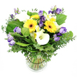 A richly textured bouquet that speaks of sunny days and quiet celebration, this arrangement gathers large-headed yellow Gerbera daisies with their characteristic dark centers, white Calla lilies with smooth, river-like curves, and soft lavender Lisianthus in a balanced, uplifting mix. Nestled among these blooms are clusters of Alstroemeria with delicate yellow markings, all framed by abundant greenery-silvery eucalyptus for a hint of cool fragrance and broad, lush leaves to give weight and fullness. The flowers sit in a clear glass cylinder vase, the water crystal clear and the stems neatly trimmed and arranged so the composition feels both polished and natural. The dark-tinted band around the stems inside the vase keeps everything aligned, a small detail that speaks to meticulous craftsmanship. Against a bright white backdrop, the bouquet projects warmth, sunshine, and a sense of refined celebration. It is the kind of gift that suits birthdays, anniversaries, or a thoughtful surprise for someone in Canonbury or Islington, with same-day delivery available to brighten a room in moments.