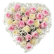 A tender heart-shaped bouquet stands as a tribute to love and remembrance, artfully arranged by a Canonbury florist who cherishes the neighbourhood's unique spirit. The design presents around thirty blush-pink and creamy ivory roses, their petals curled and velvety, with shades that harmoniously alternate to create an elegant contrast. Generous tufts of feathery white baby's breath are woven between the roses, lending an airy, almost cloud-like softness that lightens the dense floral core. The overall effect is both plush and airy, with every bloom closely nestled to define the heart's contour, symbolising affection and peace. Bathed in clean, natural light against a white background, the subtle hues glow with serenity, echoing the tranquil walks along New River Path or gentle mornings near Canonbury Square. This bouquet, crafted with local expertise, expresses heartfelt appreciation-whether offered for a poignant farewell, a loving anniversary, or as a comforting gesture in difficult times. Each element has been chosen for its purity and beauty, ultimately making this arrangement a classic choice for conveying warmth and deep emotion throughout Canonbury.