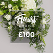 A detailed image captures a lush, premium floral arrangement in crisp white and lush green, offered as a Florist Choice Today for £100. The mass of blooms fills most of the frame, with generous hydrangea mounds forming cloud-like pockets, interspersed with tightly furled white roses and stately white lilies or lisianthus-an elegant chorus of texture and form. The greens are abundant and lively: feathery ferns lend movement, while broad, deep green leaves and eucalyptus lend a cool, silvery glow. Set against a soft, neutral grey backdrop, the composition radiates freshness, balance, and quiet confidence, as if designed for a modern home or a meaningful gesture.

Centered over the bloom, a clean rectangular white box sits with a framed border. Inside, 'Florist Choice' flows in a refined script, followed by 'TODAY' in a crisp sans-serif line, and below that, the price £100 in bold white numerals. The lettering, slightly translucent, allows the surrounding foliage to peek through, echoing the bouquet's sense of lightness and restraint while signaling a timely offer.

Ideal for heartfelt occasions-sympathy, condolences, anniversaries-or simply as an everyday statement of elegance, this spray speaks of Canonbury's floristry craft. It would arrive fresh for delivery across Canonbury and nearby Islington streets, or for collection from the shop, ready to brighten a room with its pristine whites and vibrant greens. The image embodies the care and precision of Canonbury Flowers, a local craft that blends classic floral language with contemporary presentation for a London audience seeking quality and reliability.